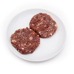 kangaroo meat burgers isolated on a white background.
