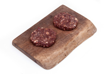 kangaroo meat burgers isolated on a white background.