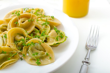 Ravioli stuffed with spinach pesto
