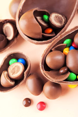 Chocolate Easter eggs on wooden table, closeup