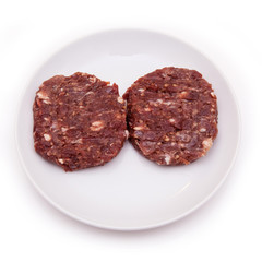kangaroo meat burgers isolated on a white background.