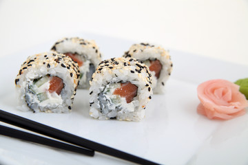 Uramaki with salmon.  Traditional japanese sushi rolls