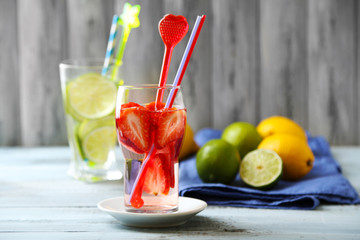 Cocktails with fresh strawberries and lemon lime