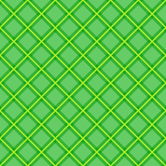 Fototapeta na wymiar Plaid fabric background with yellow and green. Abstract seamless