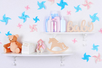 Baby accessories on shelves close-up