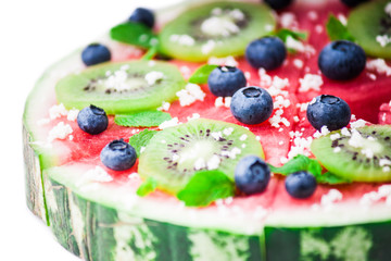 Watermelon pizza on white
