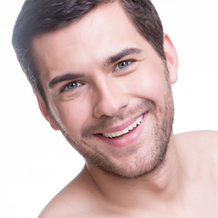 Obraz premium Portrait of handsome smiling young man.