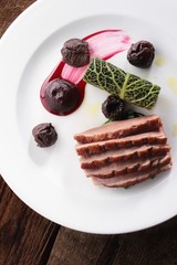 plated duck breast meal