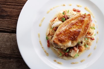 pan fried chicken breast plated main meal