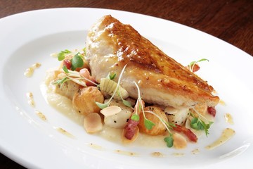 pan fried chicken breast plated main meal