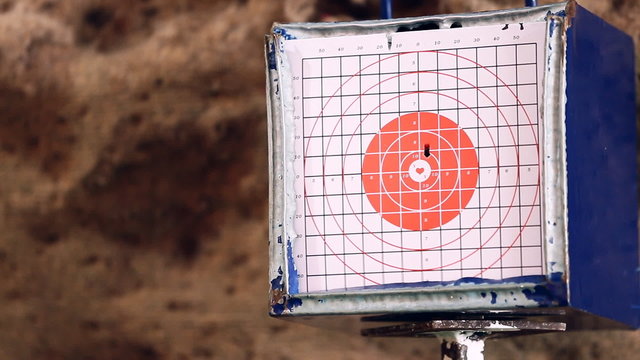 gun shoot to the shooting target concept