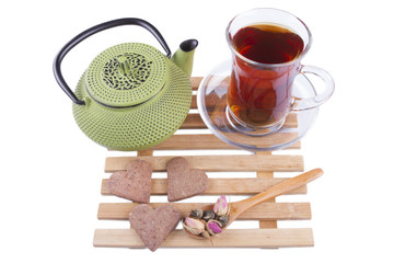 Cup of tea with teapot