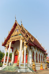 Fototapeta premium emple with tree and sky background at Wat Chantharangsri