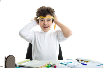 Caucasian smooth-skinned boy is tying around the forehead a yell