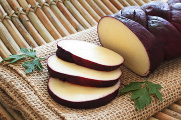 Treccia - braided Mozzarella cheese marinated in red wine 