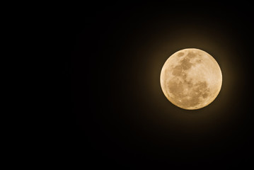Full moon on dark sk
