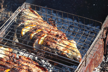 fish fried in grill outdoors