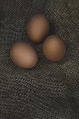 Eggs on sackcloth background