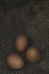 Eggs on sackcloth background