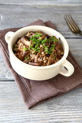Tasty Buckwheat with mushrooms in a bowl