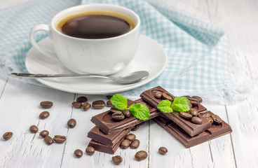 Dark chocolate with a cup of coffee