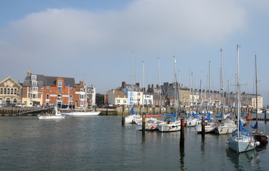 Fototapeta na wymiar Boats moored in Weymouth harbour, Dorset