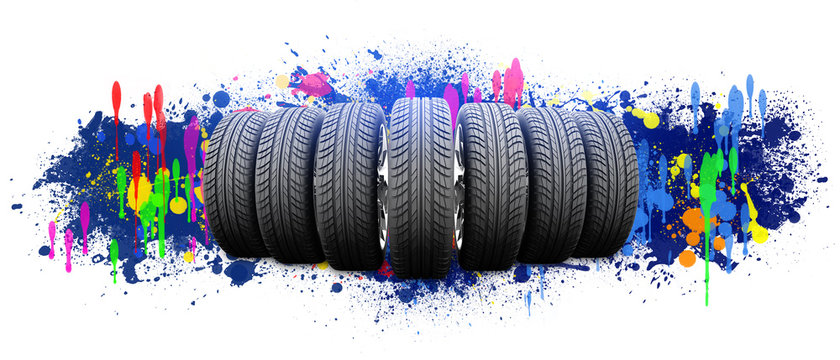 Seven new car wheels. Abstract background is colored blots