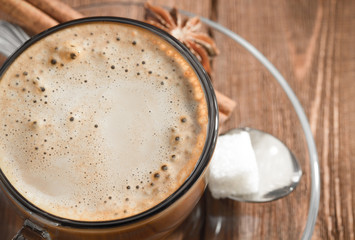 cup of coffee on wood