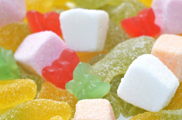 Sour jelly purple, yellow and white candy