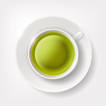 White cup of green tea.