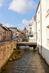 Voulzie river and medieval street in Provins, France