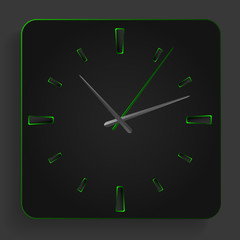 Analog clock with green neon lights.