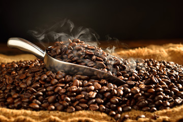 Coffee beans with smoke on burlap