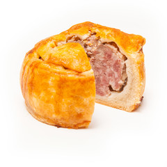 Pork pie isolated on a white studio background.