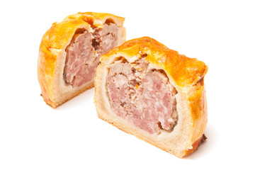 Pork pie isolated on a white studio background.