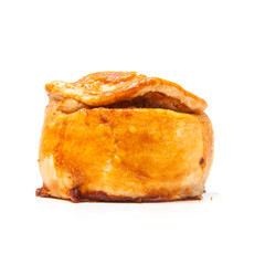 Pork pie isolated on a white studio background.