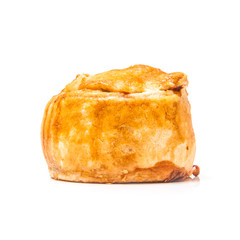 Pork pie isolated on a white studio background.