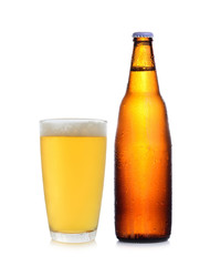 A bottle and glass of beer isolated on white