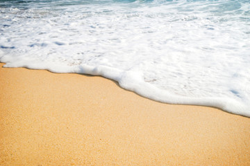 Water edge and sand. Summer beach background