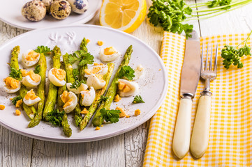 Grilled asparagus with quail eggs