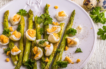 Grilled asparagus with quail eggs