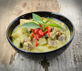 Green curry Chicken Intense soup on wood, Thai cuisine