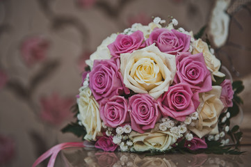 Bunch of flowers from roses on a table 2379.