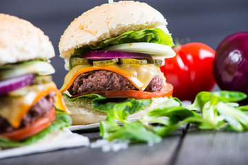 traditional pub style burger  on wooden table