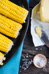 hot golden corn cob with butter and salt