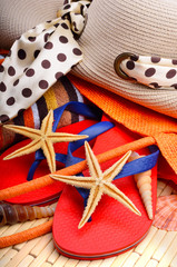 Beach hat and bag with  towel and starfish
