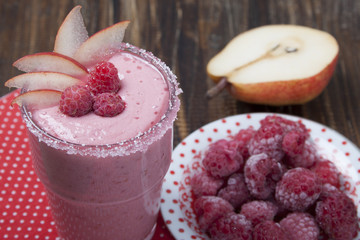 Fruit - berry smoothies with  pear and raspberries  with yogurt