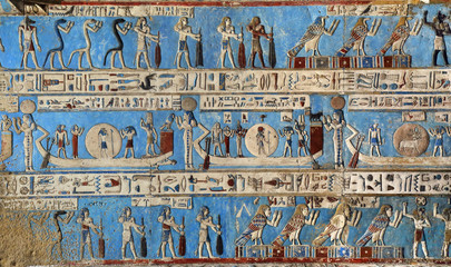 Hieroglyphic carvings in ancient egyptian temple
