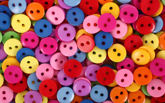 Colorful buttons pile multicolor background