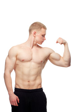 Image of muscle man posing in studio